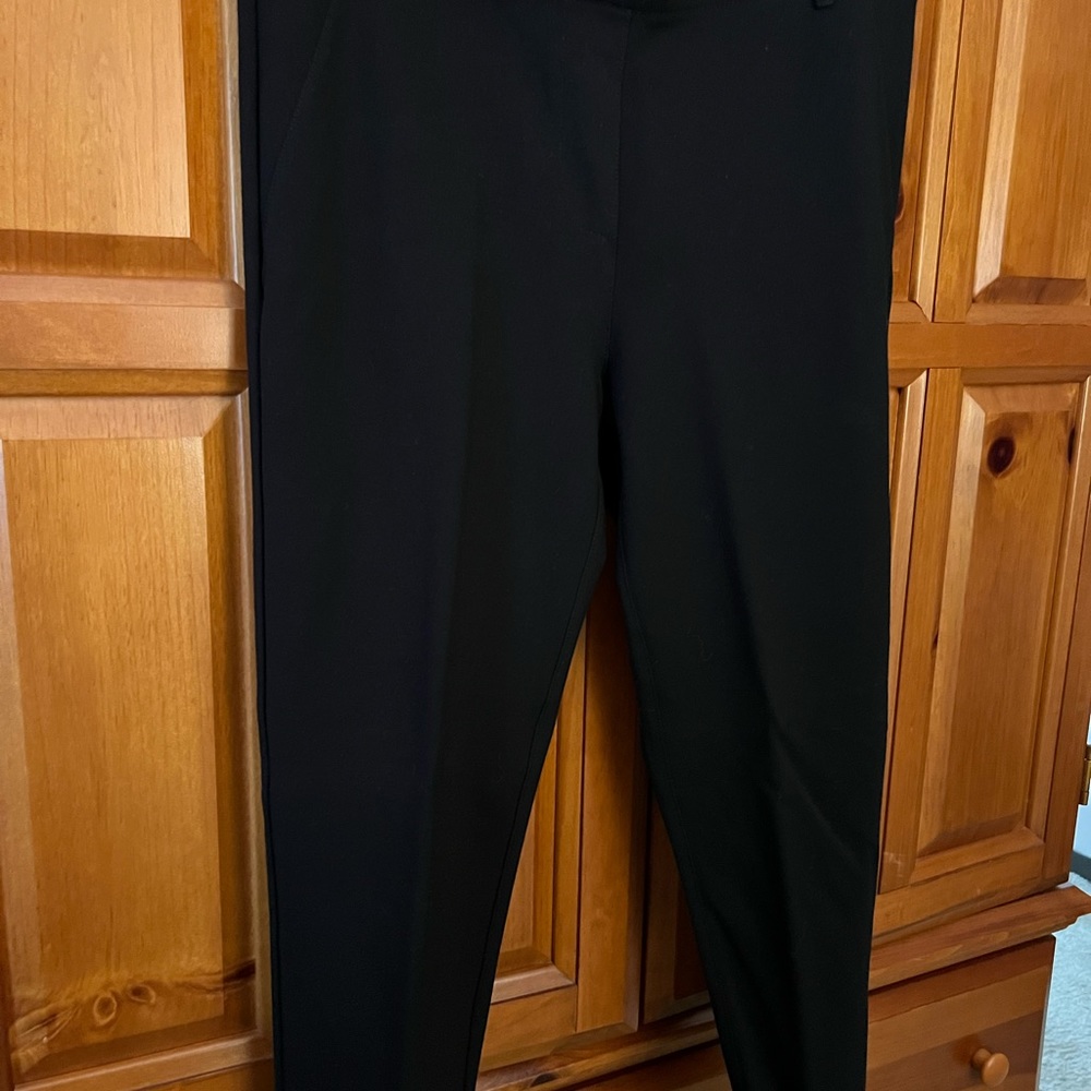 Nice variety of black dress pants .